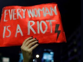 Every Woman is a riot poster