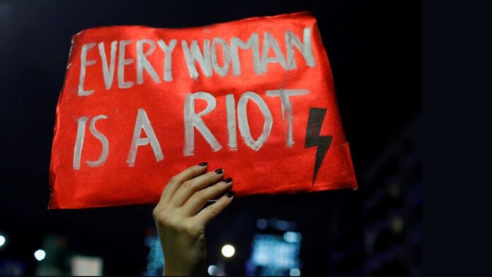 Every Woman is a riot poster